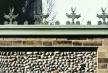 Nineteenth century cast iron detailing on nearby village boundary wall