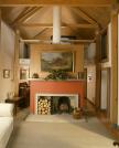 Bucknall House: central fireplace as a room divider