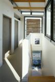 Hollick House: internal view down to the entrance pool 