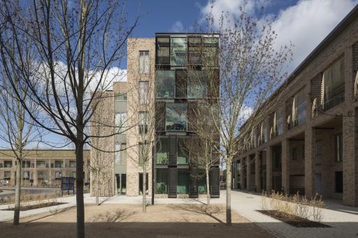 Marker buildings set within the court make reference to the urban form of Cambridge colleges